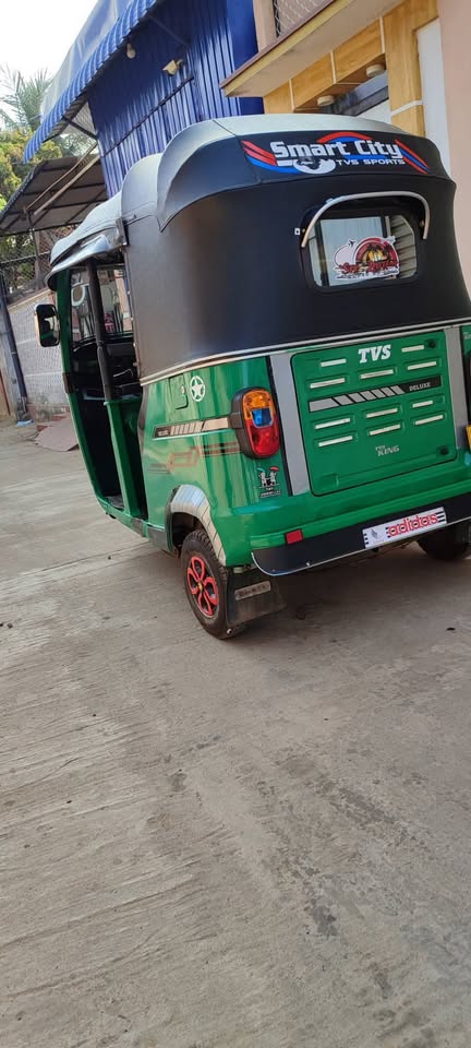 Green Three Wheeler TVS