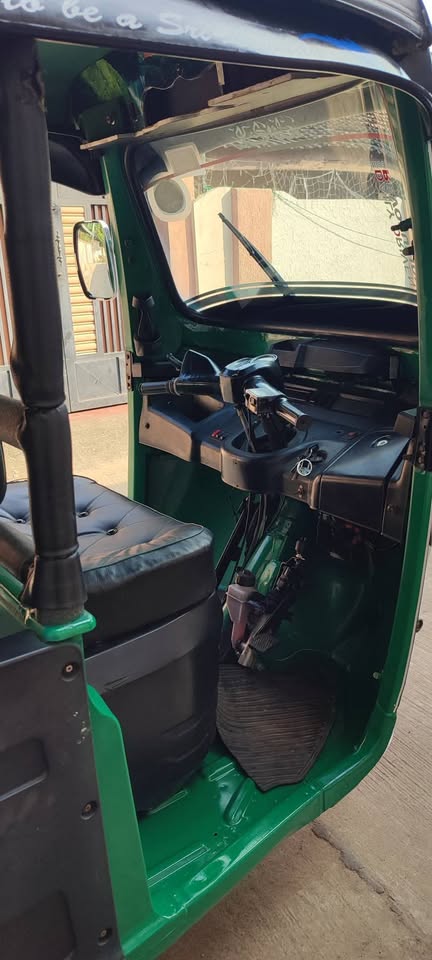 Green Three Wheeler TVS