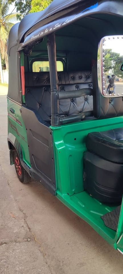 Green Three Wheeler TVS