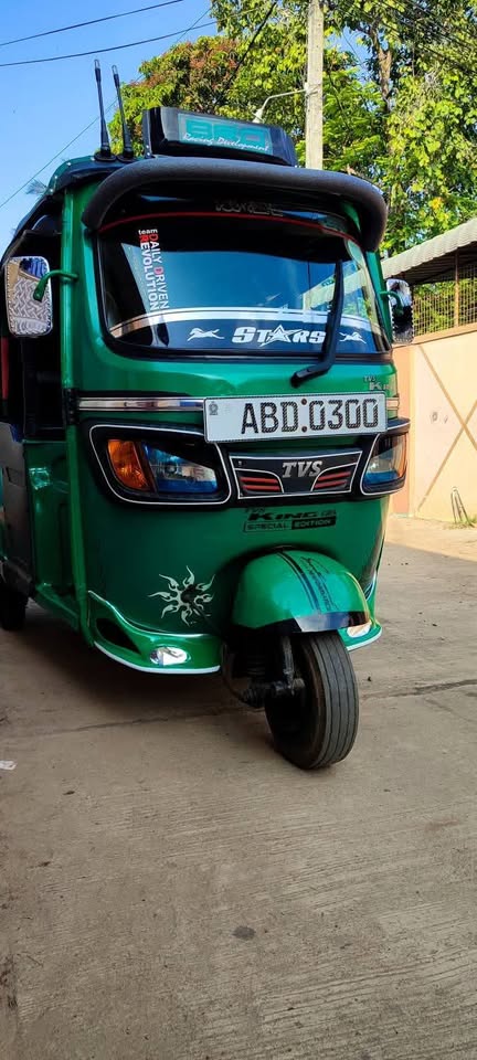 Green Three Wheeler TVS